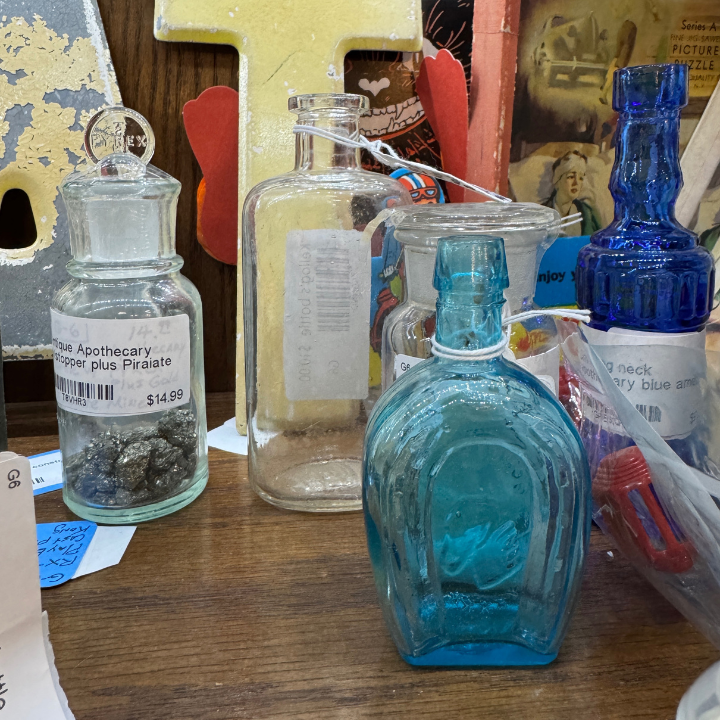 The Fascinating History of Apothecary Jars & Vintage Medicine Bottles