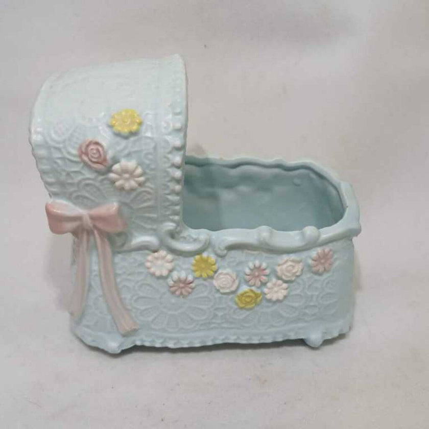 Baby Crib Porcelain Figure