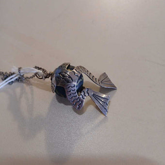 Vintage Zuni silver Frog clan pendant covering a world