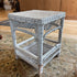 White wicker shelf