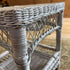 White wicker shelf