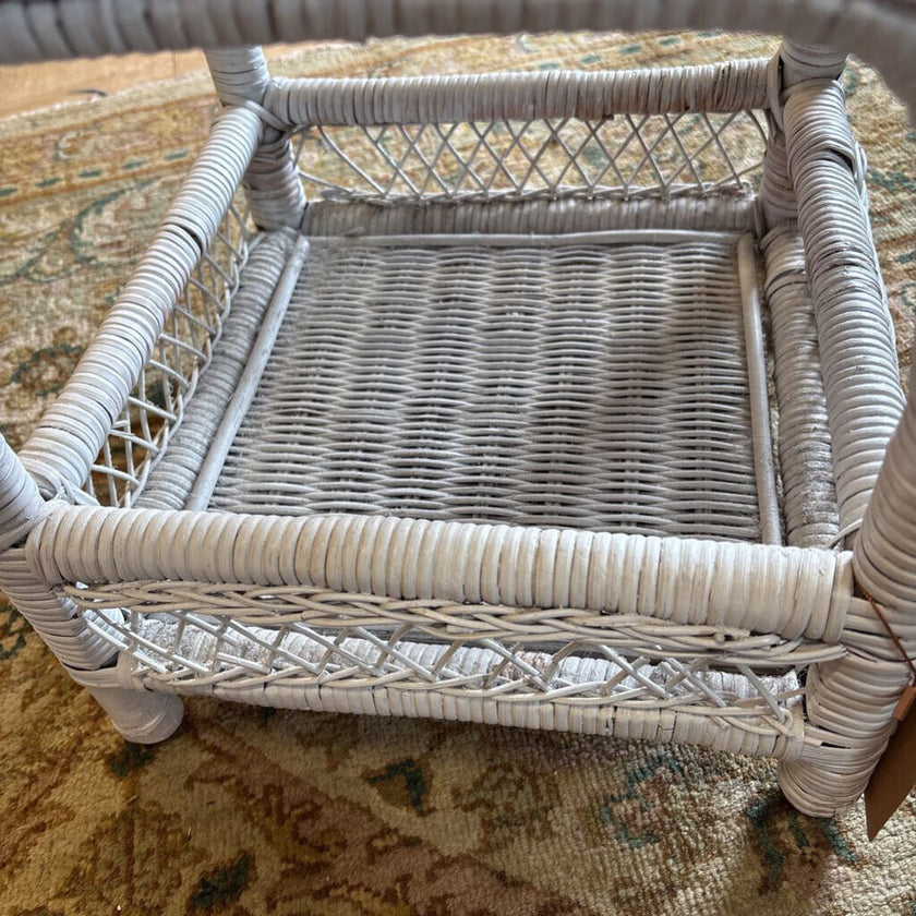 White wicker shelf
