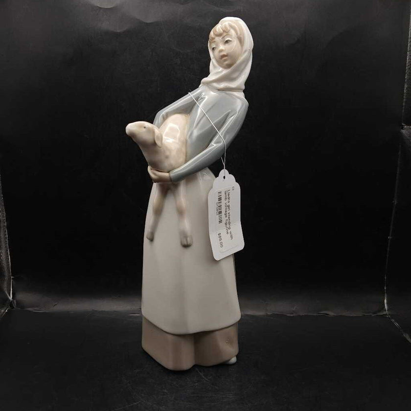 Lladro girl standing with lamb vintage figurine