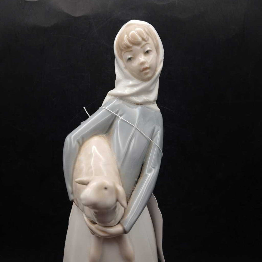 Lladro girl standing with lamb vintage figurine