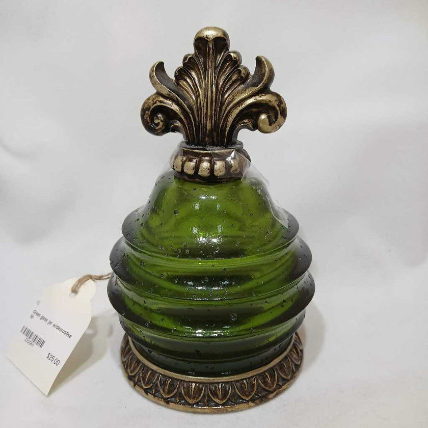 Green glass jar w/decroative lid