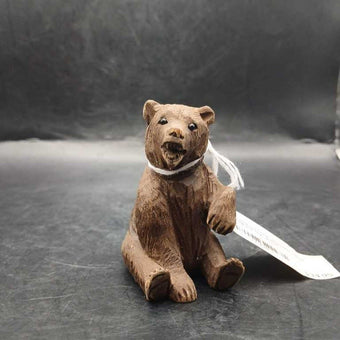 Hand carved wooden bear signed by artist