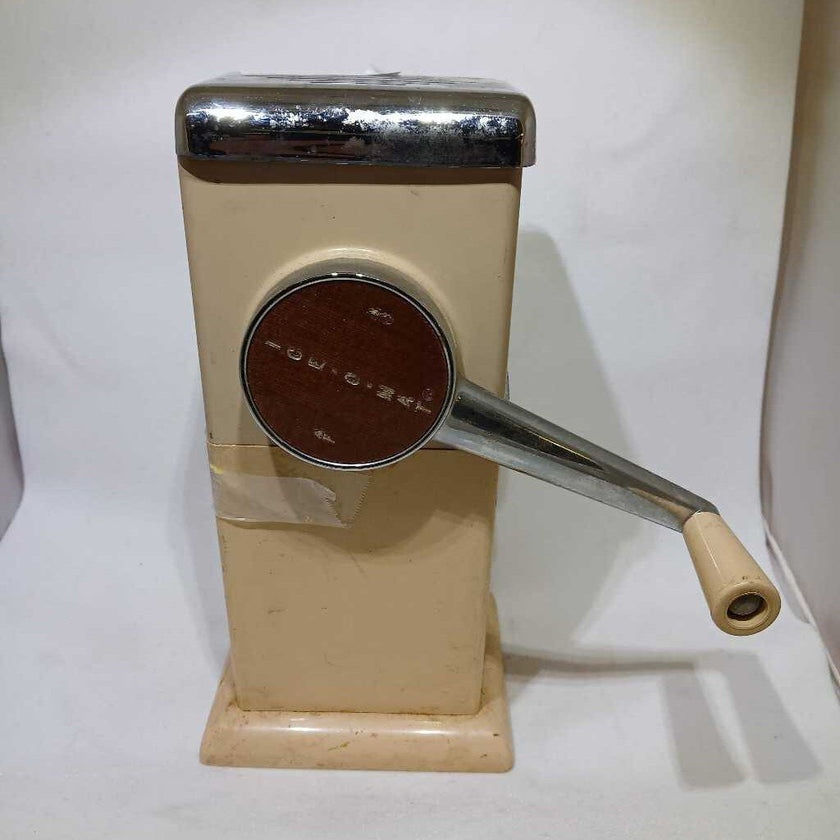 Antique ice crusher