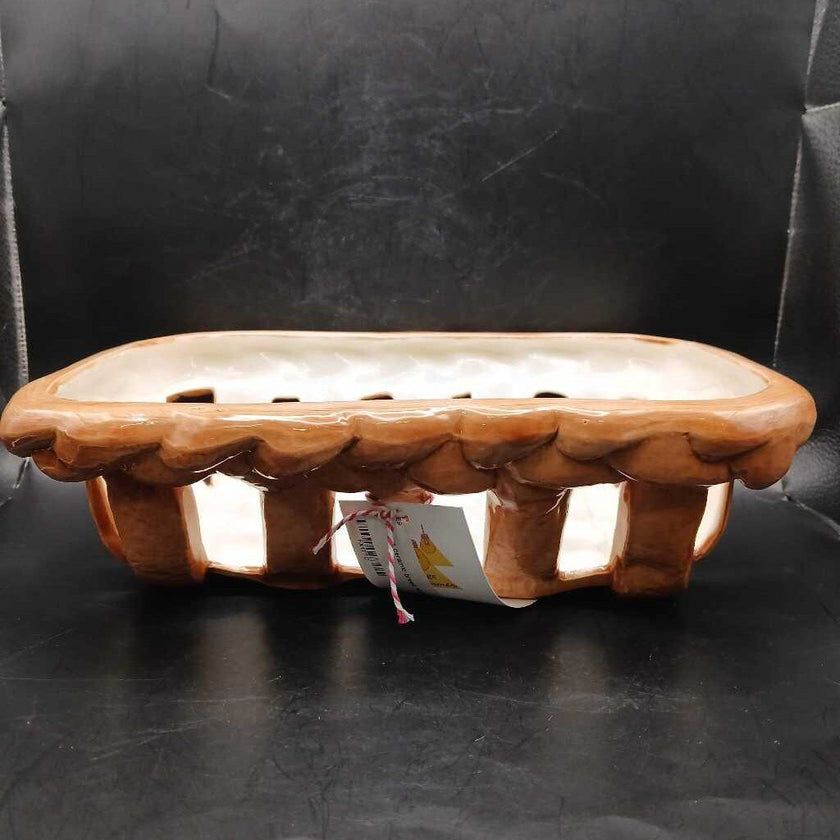 Woven ceramic bread basket