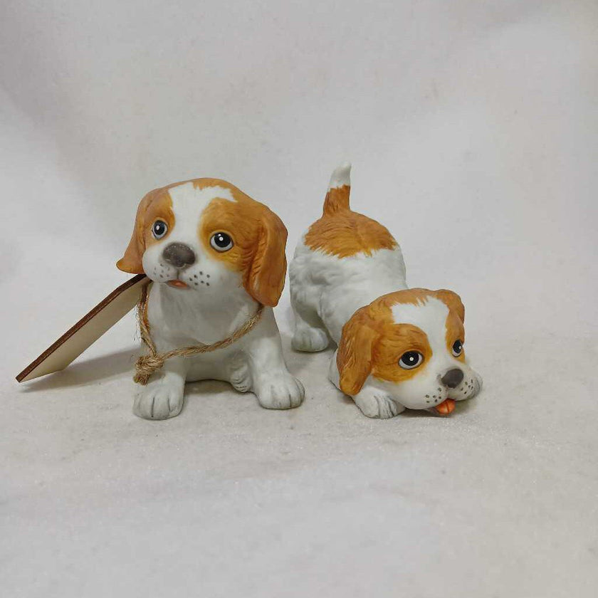 Sit of two puppies