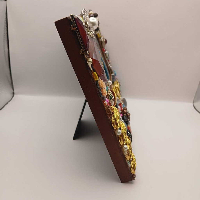 Jewelry covered picture frame