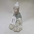 Beautiful LLadro Boy Sitting with Sheep