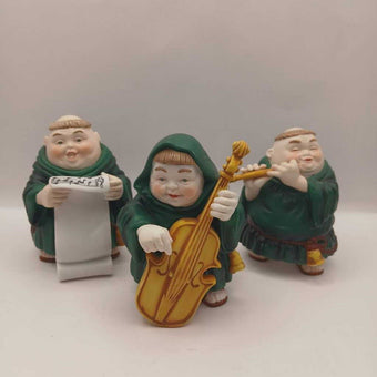 3 monk musicians