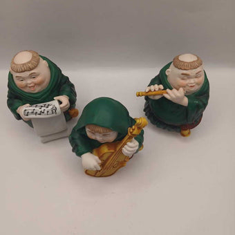 3 monk musicians
