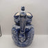 Blue pitcher with horse head on handle