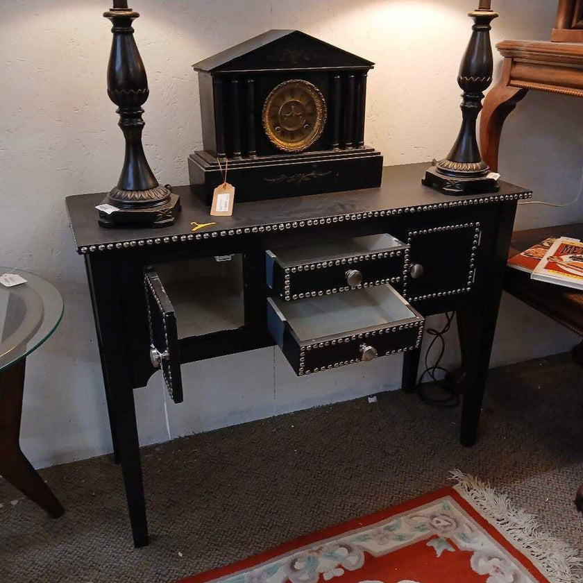 Black studded console table