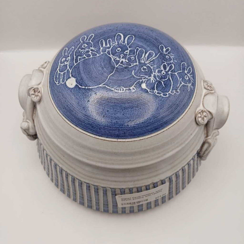 Signed David Hamilton, hand throne, pottery with rabbits