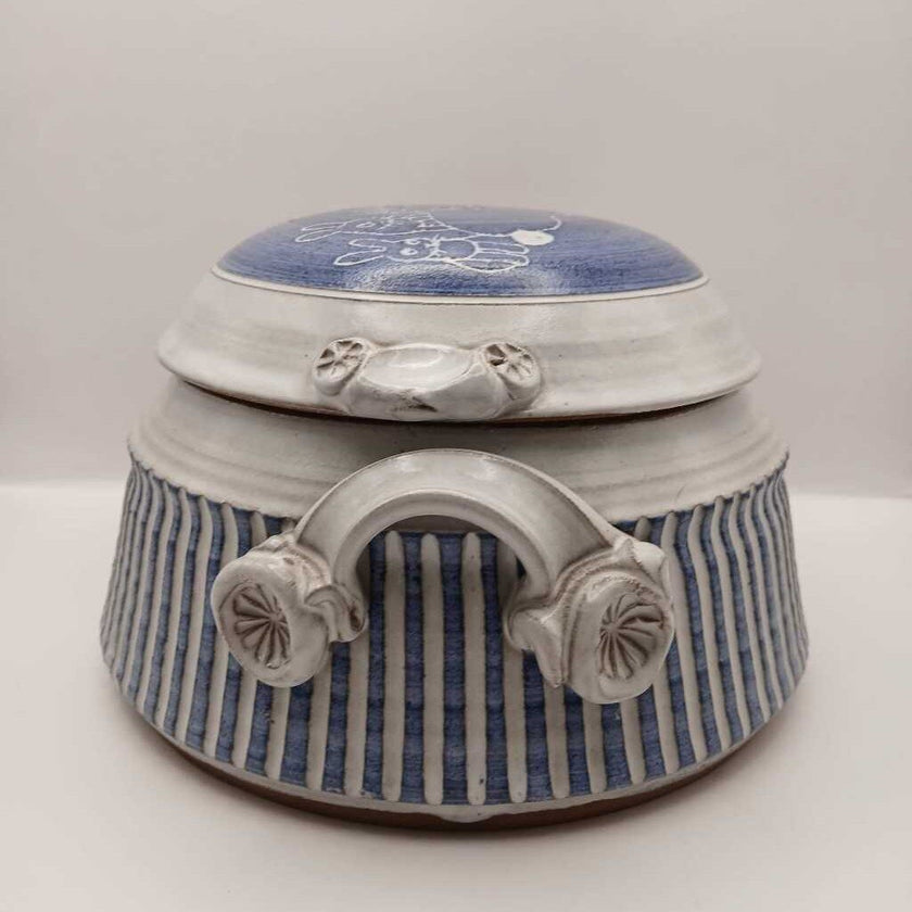 Signed David Hamilton, hand throne, pottery with rabbits