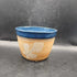 Handmade ceramic pot with leaf and blue rim SV Maker mark
