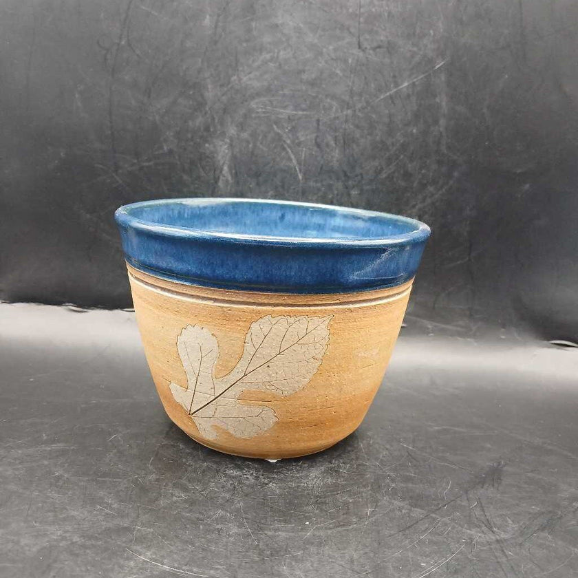 Handmade ceramic pot with leaf and blue rim SV Maker mark