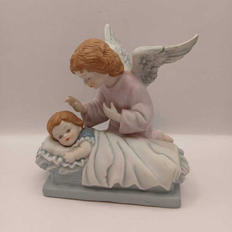 Guardian angel and child figurine