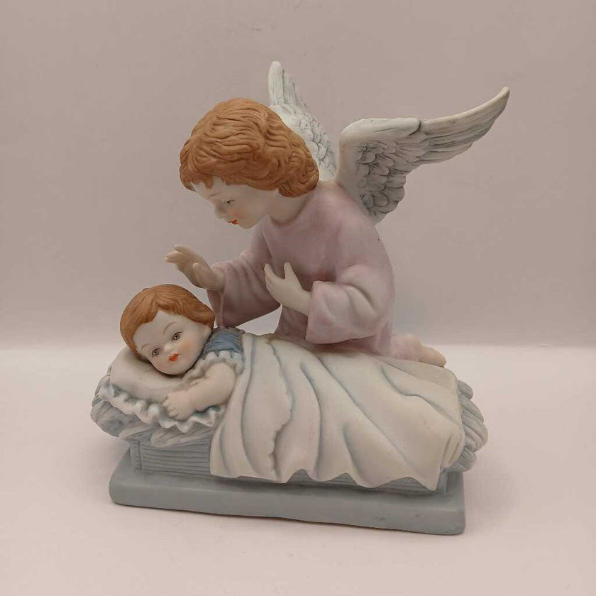 Guardian angel and child figurine