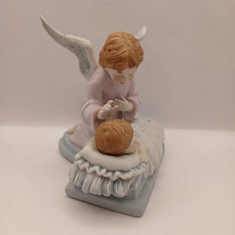 Guardian angel and child figurine