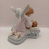 Guardian angel and child figurine