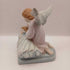 Guardian angel and child figurine
