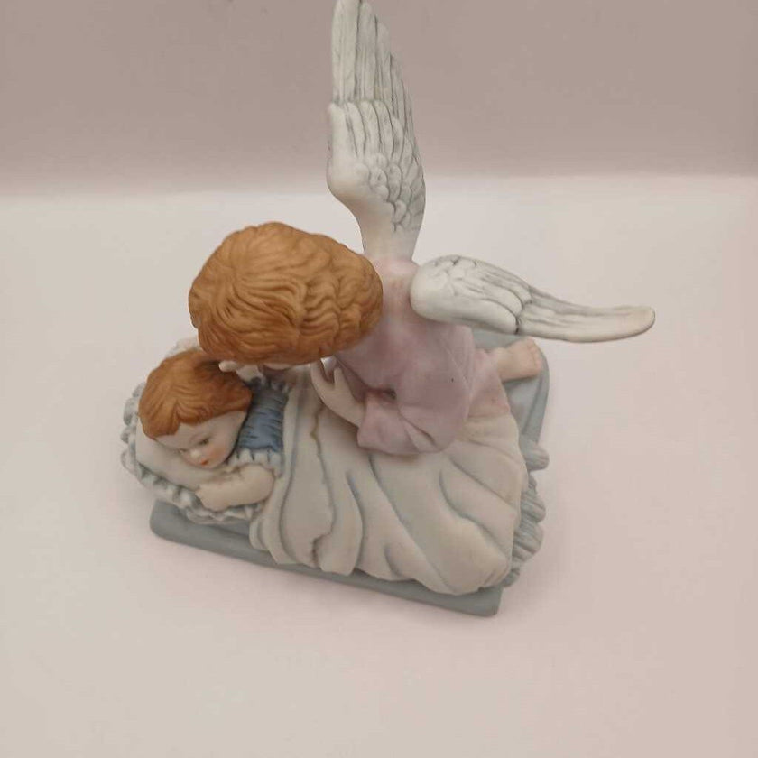 Guardian angel and child figurine