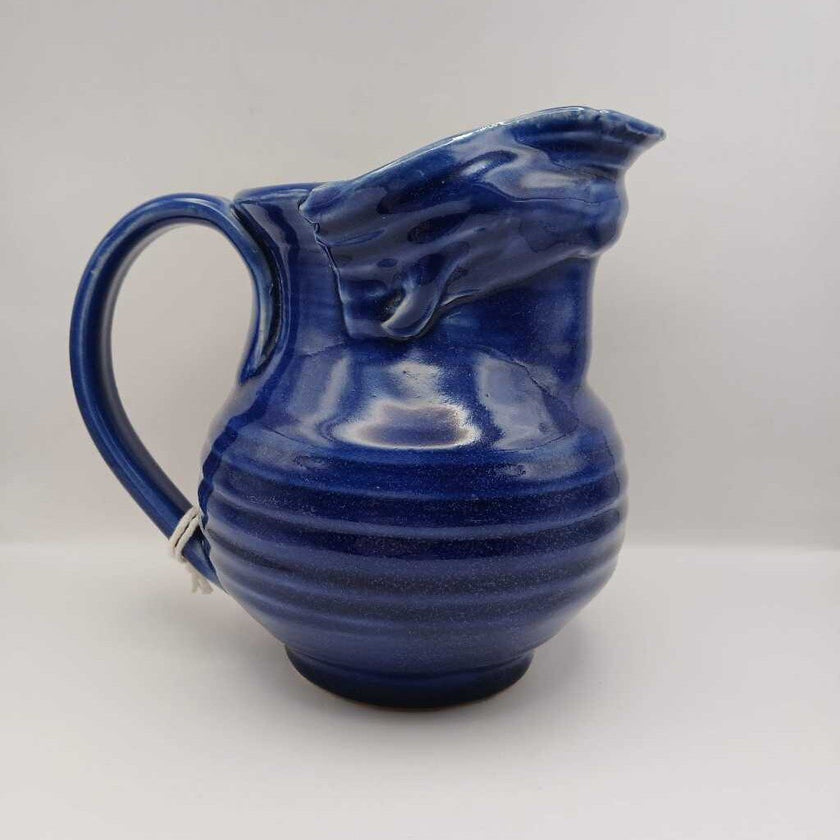 Blue Art Pottery Pitcher signed Staskal