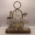 A18. Vintage condiment set from England. 6 cut glass jars and lids and 1 spoon