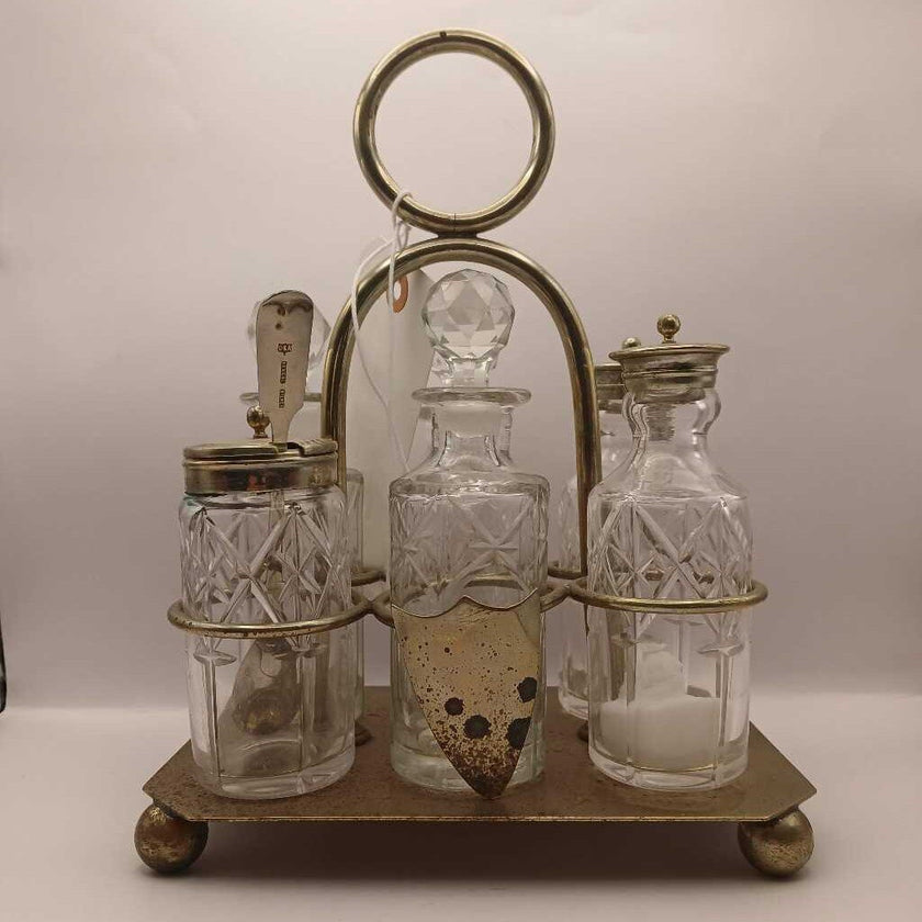 A18. Vintage condiment set from England. 6 cut glass jars and lids and 1 spoon