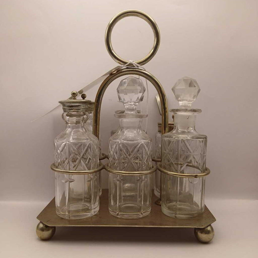 A18. Vintage condiment set from England. 6 cut glass jars and lids and 1 spoon