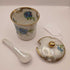 Vintage floral condiment jar with spoon and lid