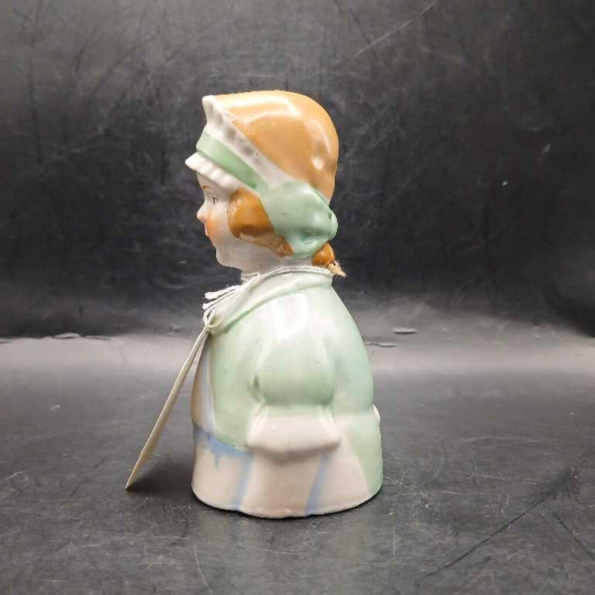 Vintage porcelain lady bell