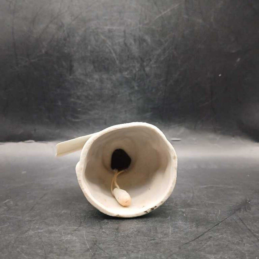 Vintage porcelain lady bell