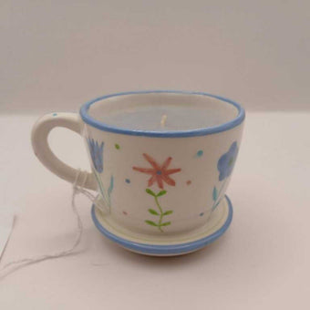Teacup with candle