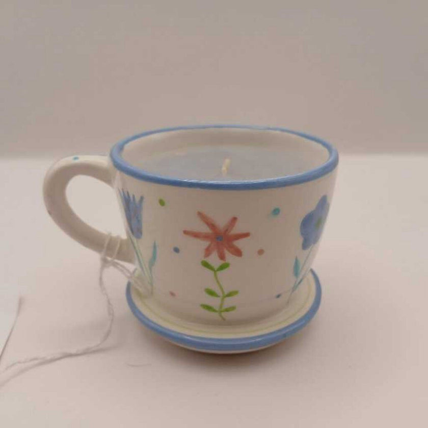Teacup with candle