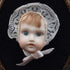Framed Baby Face Cameo or Sculpture