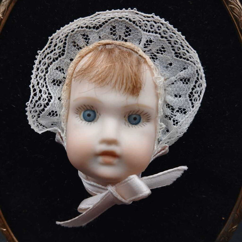 Framed Baby Face Cameo or Sculpture