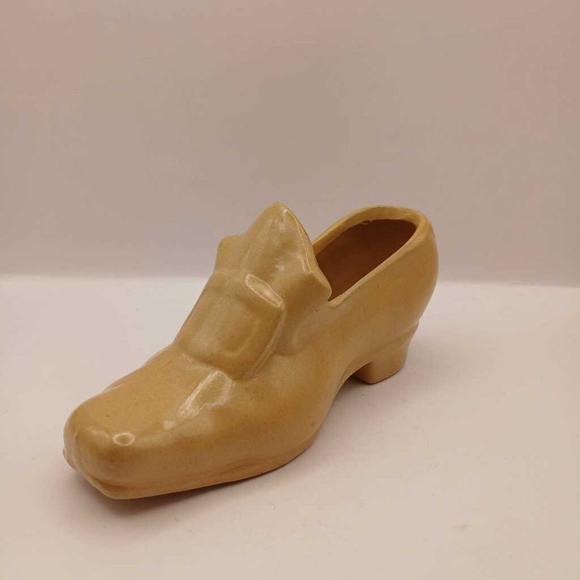 A vintage, yellow high heel shoe planter, 2.5