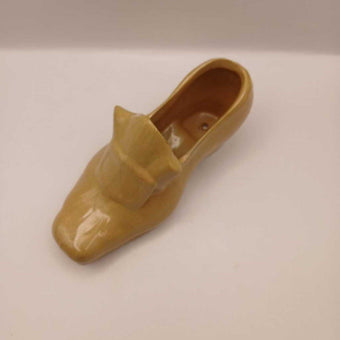 A vintage, yellow high heel shoe planter, 2.5