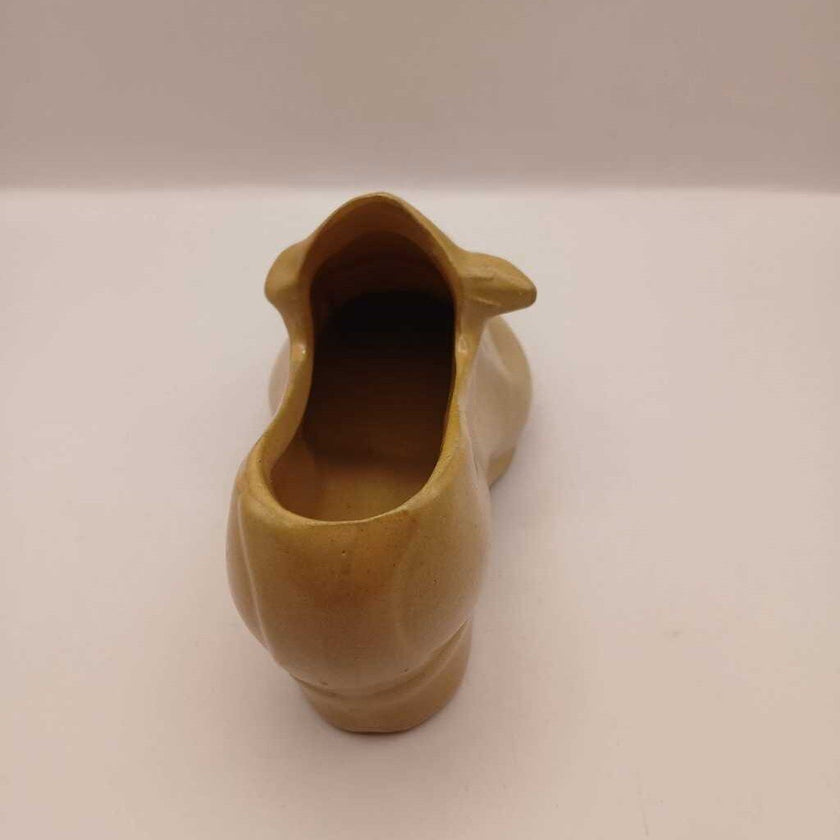 A vintage, yellow high heel shoe planter, 2.5
