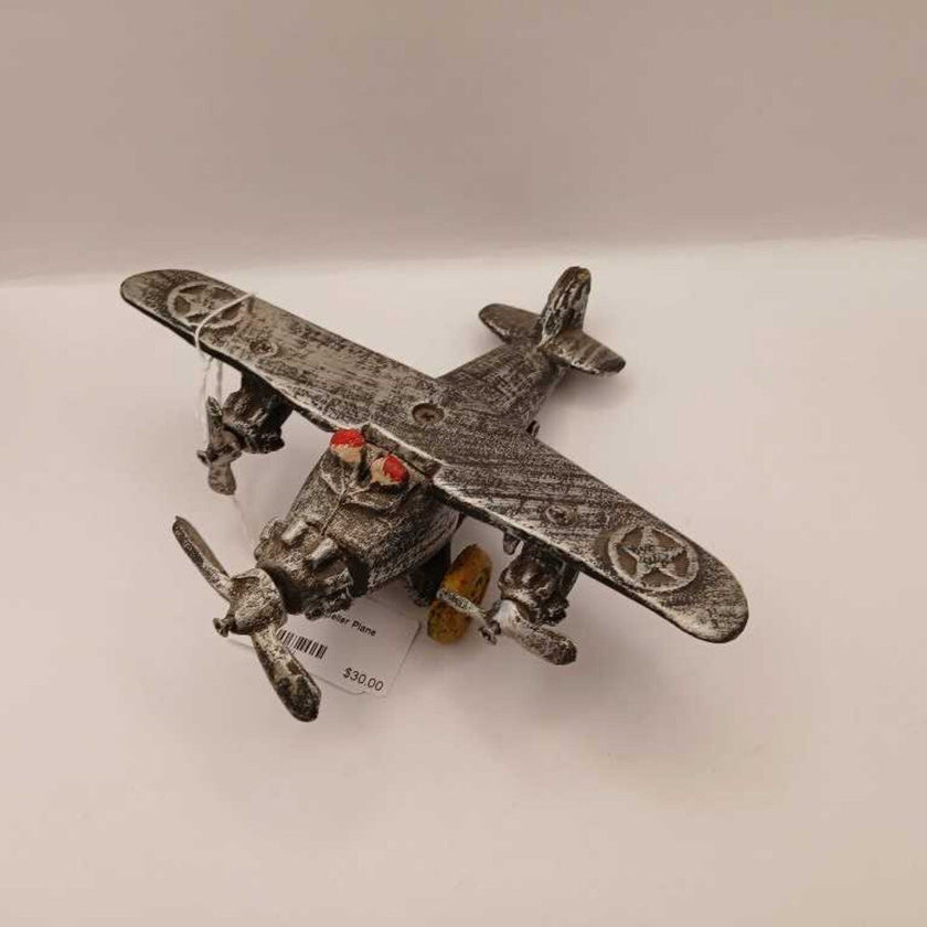 Vintage 3 propeller Plane