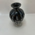 Vintage black and white perfume bottle