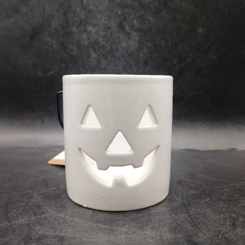 WH ceramic Jack O Lantern candle holder