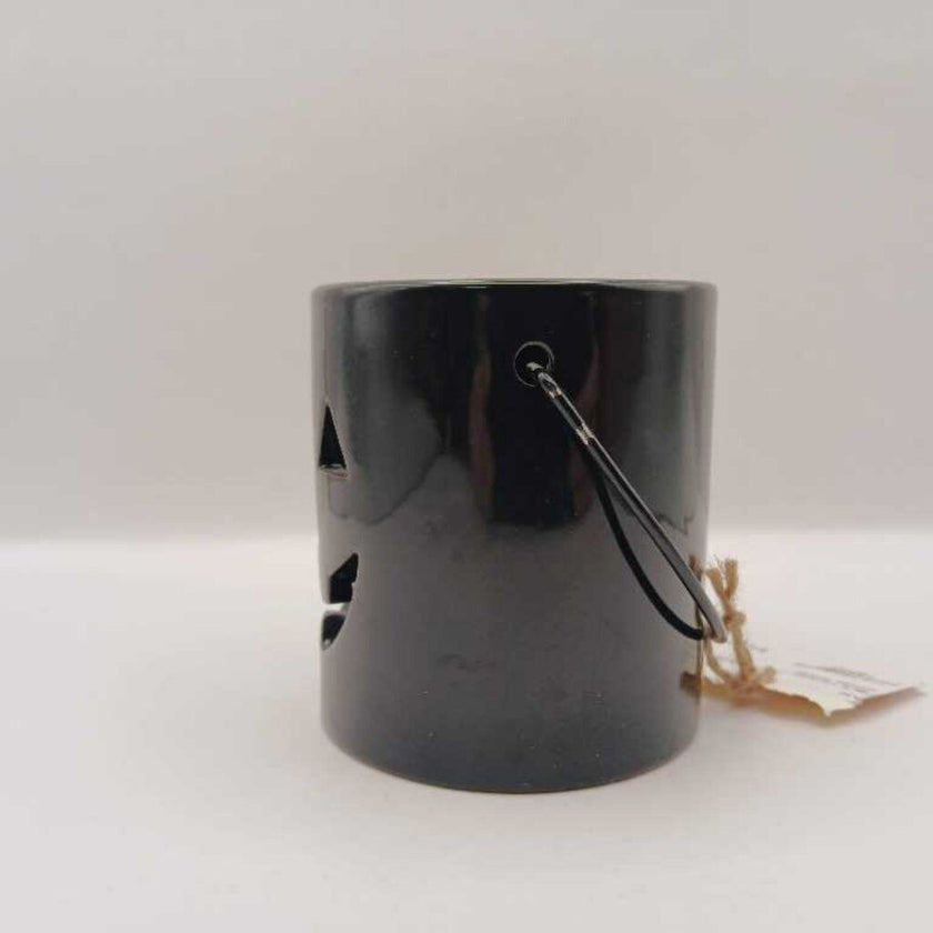 BLK ceramic Jack O Lantern candle holder