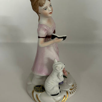 Vintage Capodimonte style porcelain figurine of a girl with a cat, Italy