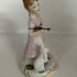Vintage Capodimonte style porcelain figurine of a girl with a cat, Italy