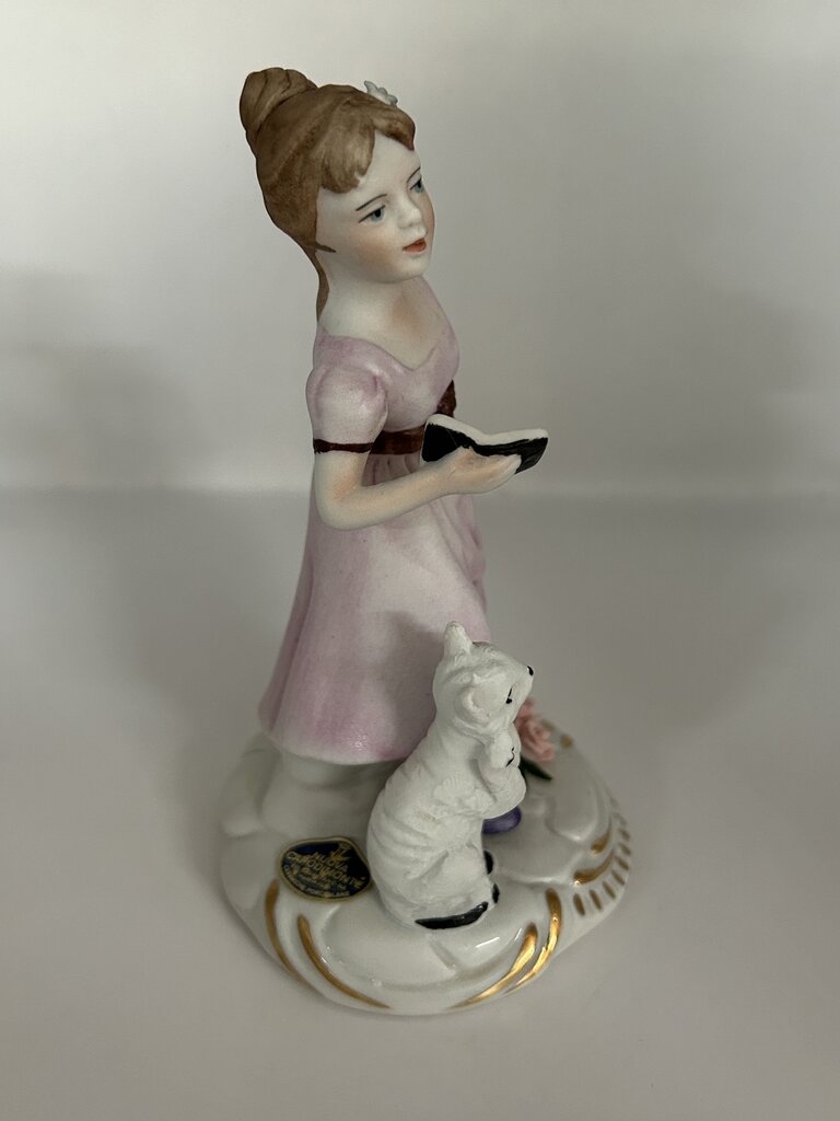 Vintage Capodimonte style porcelain figurine of a girl with a cat, Italy